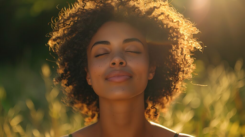 a captivating shot of a person practicing mindfulness in nature, their skin glowing with inner radiance from a holistic approach to beauty