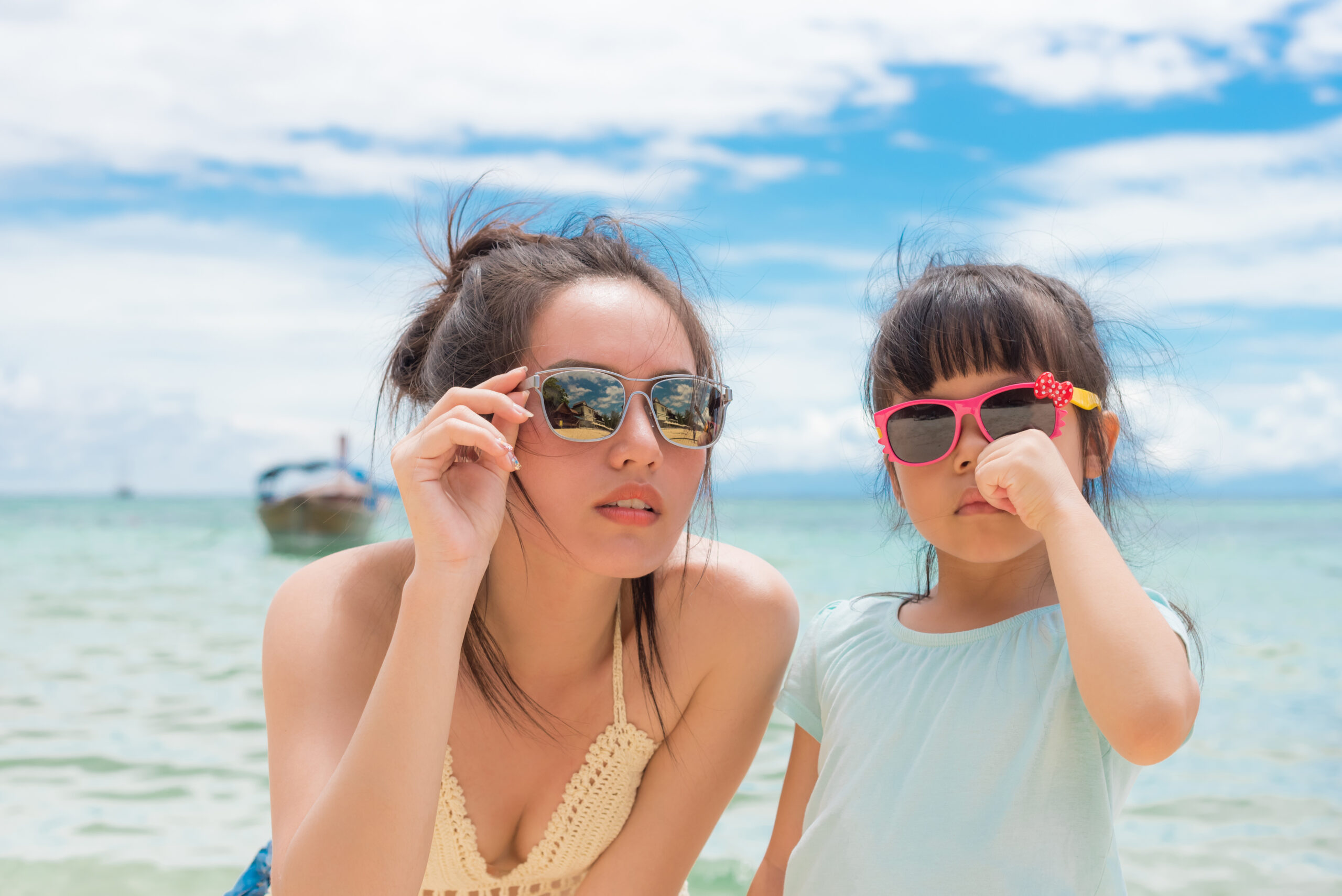 little girl and her mother have a good time at the seaside resort